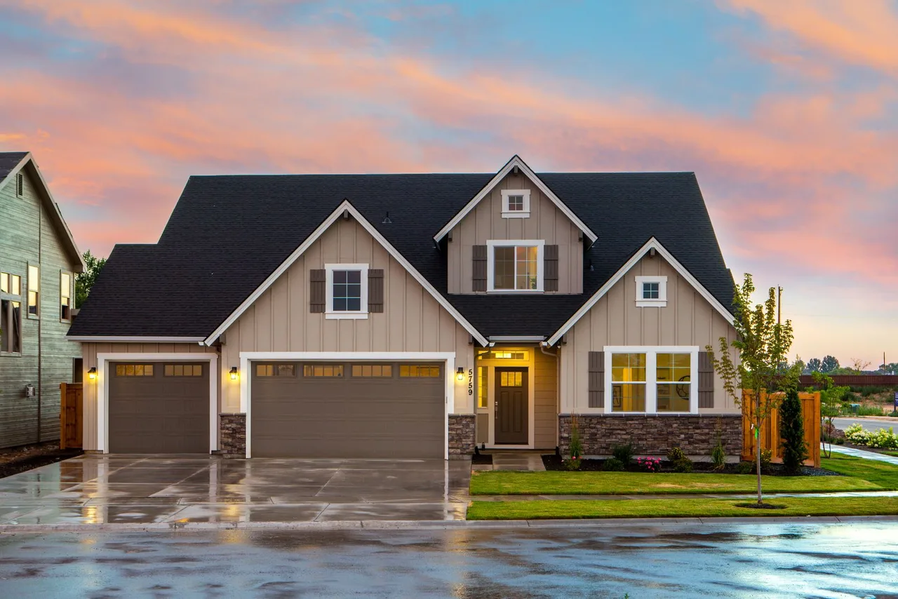 Modern two-story home at sunset